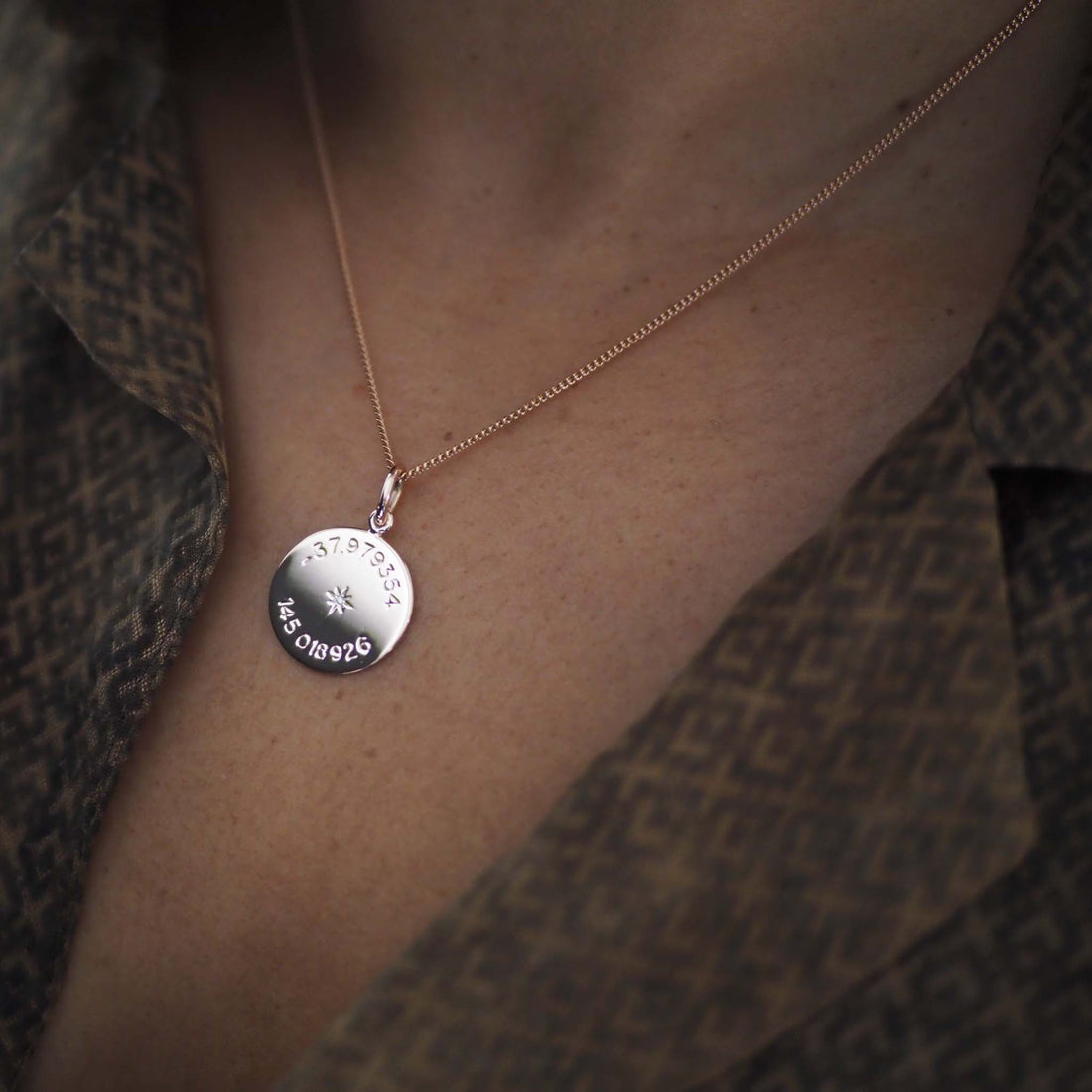 latitude and longitude diamond necklace available in yellow, rose, and white gold, symbolising unique personal locations