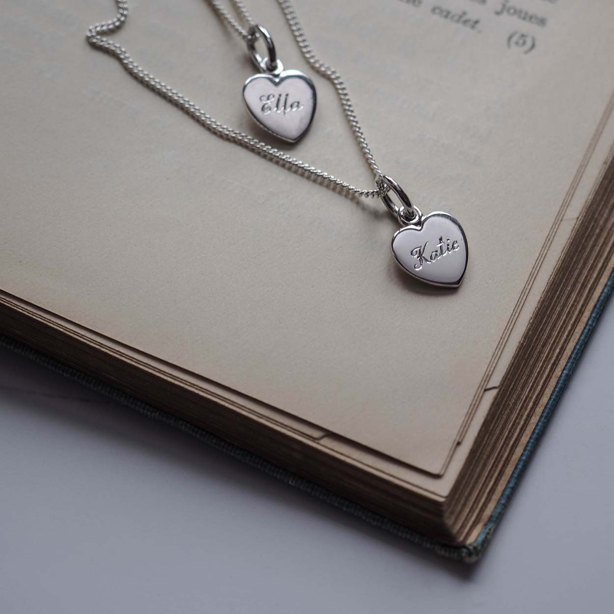 Personalised Name Heart Necklace in 9ct Gold, available in Yellow, White, or Rose. Engraved with a name, this heart-shaped pendant symbolises timeless love and connection.