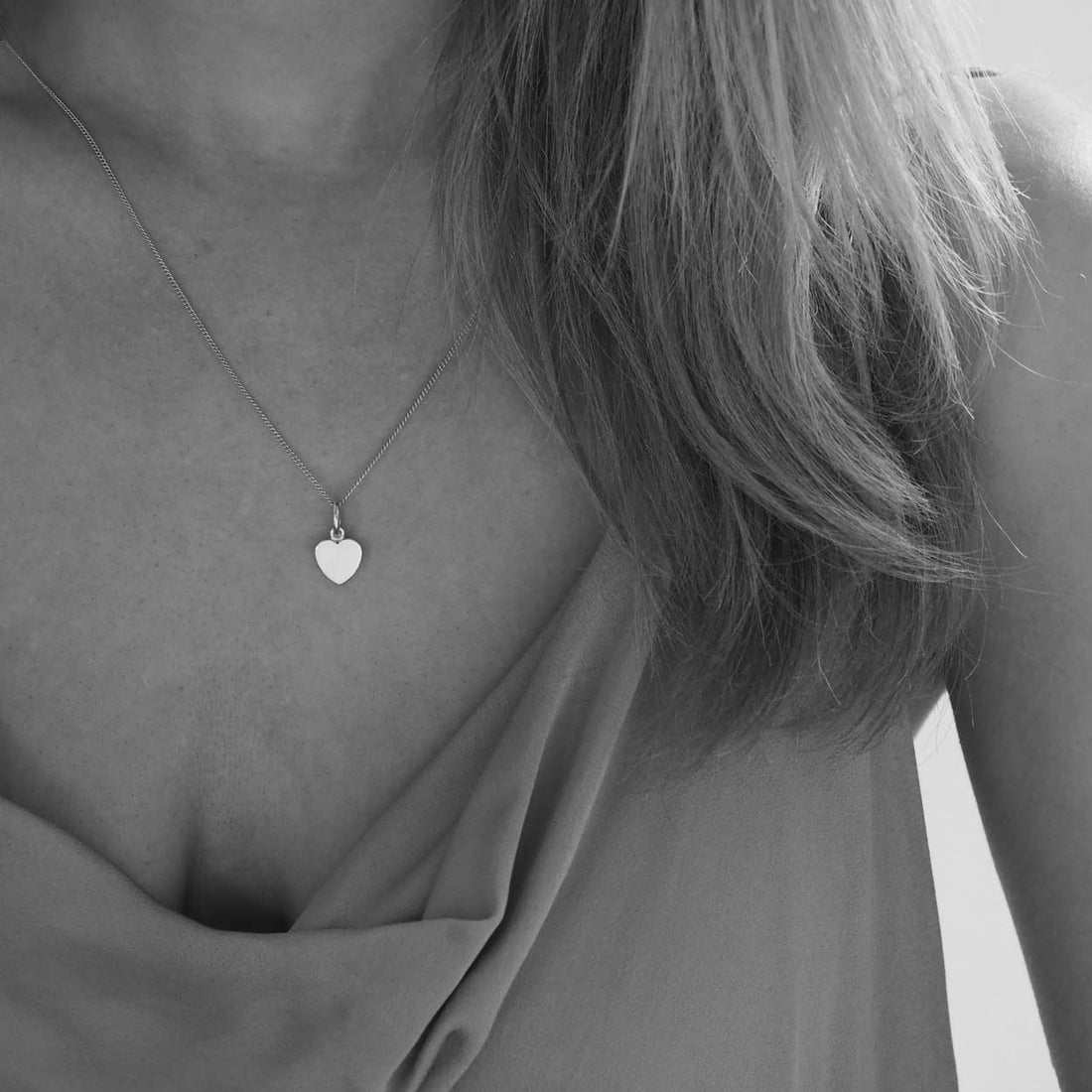 Handcrafted Love Heart Necklace in recycled sterling silver or gold vermeil, designed in London — a soft, sculptural symbol of love.