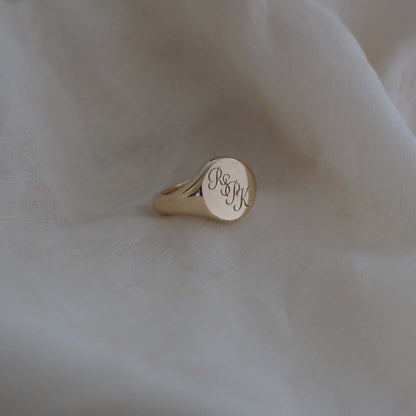  Handmade Triple Initial Signet Ring with intricate scrolled initials, symbolising timeless elegance and individuality