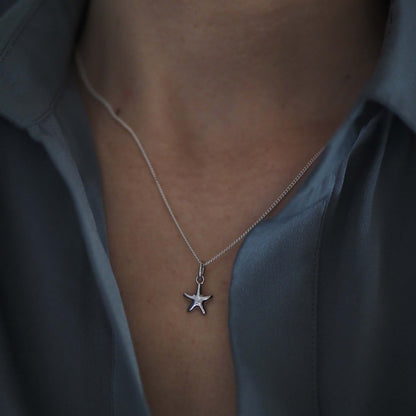 Bianca Jones sculptural style starfish necklace in sterling silver or gold vermeil, evoking the beauty of oceanic life.