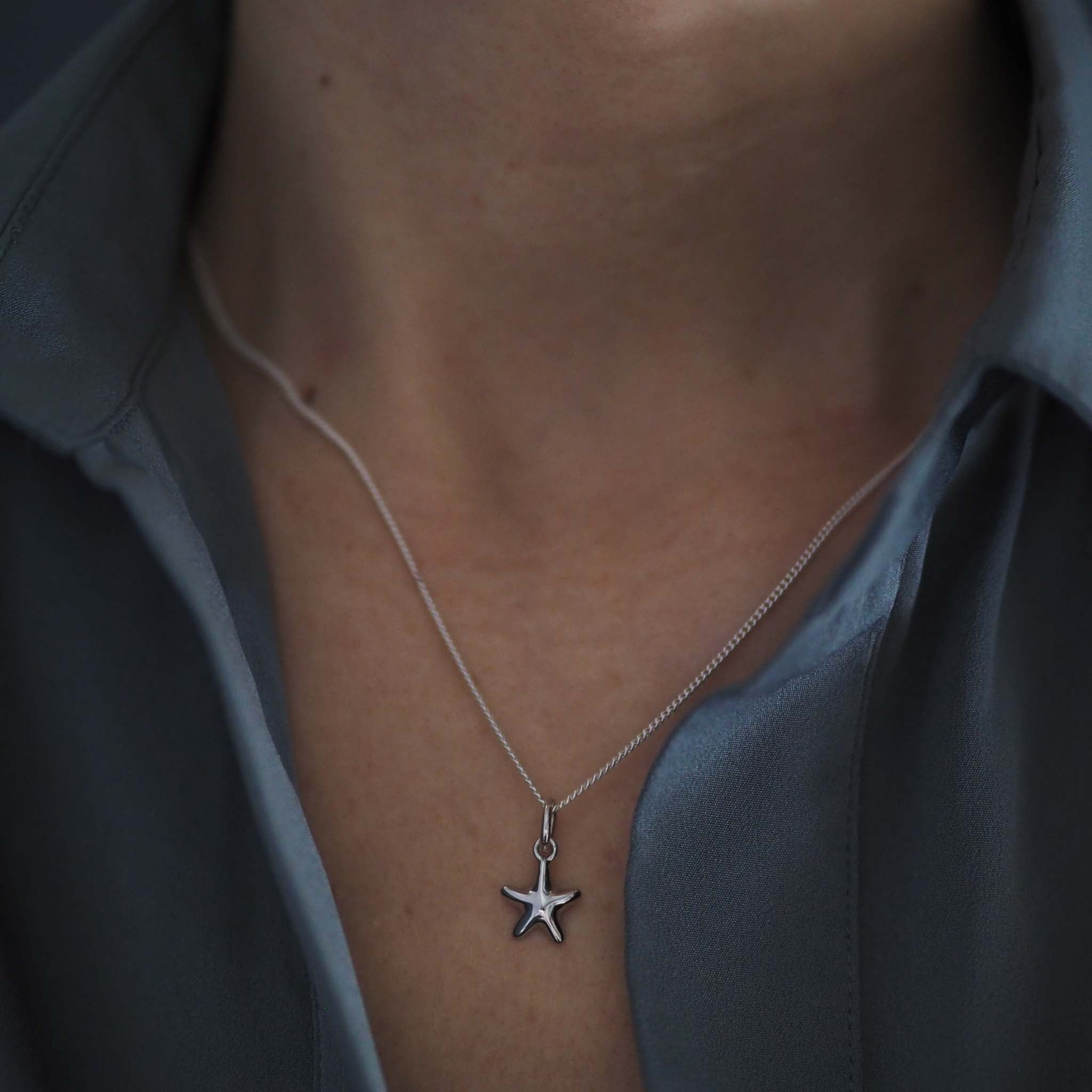 Bianca Jones sculptural style starfish necklace in sterling silver or gold vermeil, evoking the beauty of oceanic life.