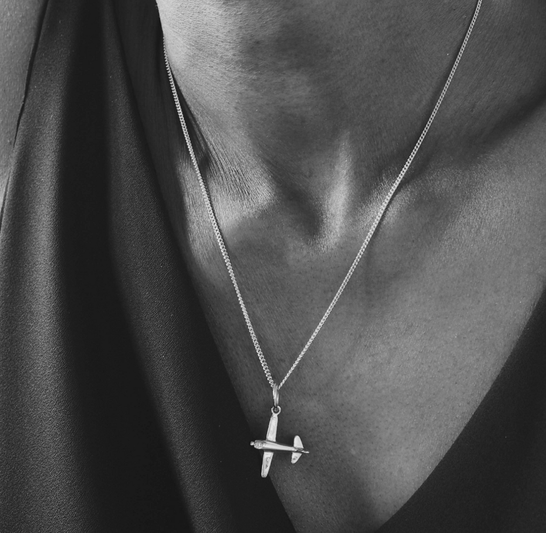 Aeroplane necklace worn at 20 inch length - sterling silver