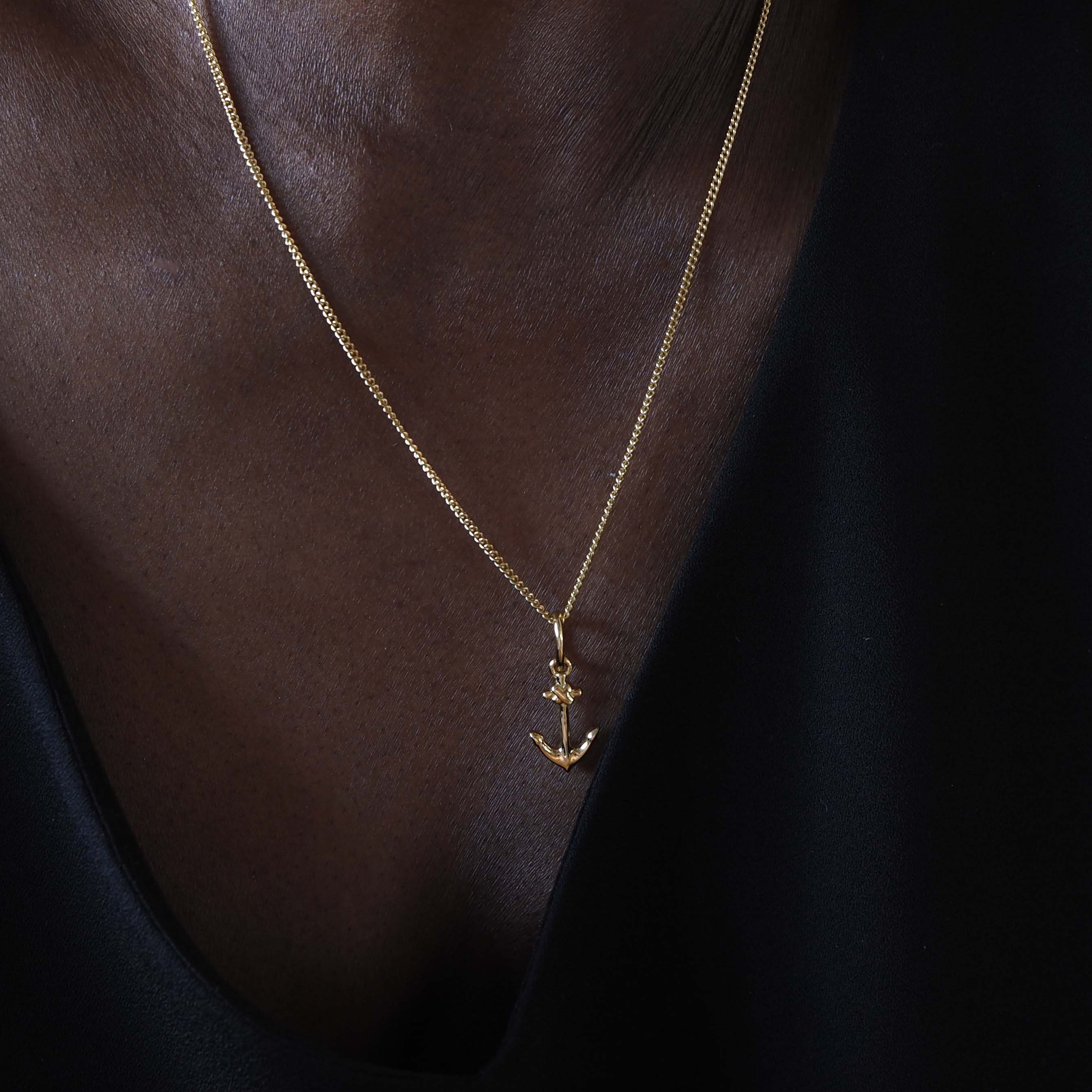 Handmade 18ct gold anchor necklace shown on model
