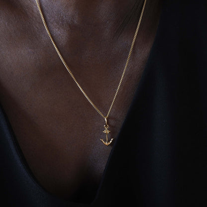 Handmade 18ct gold anchor necklace shown on model