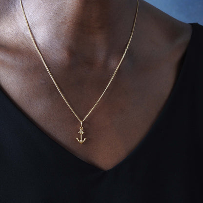 Anchor talisman necklace in 18ct gold, worn solo