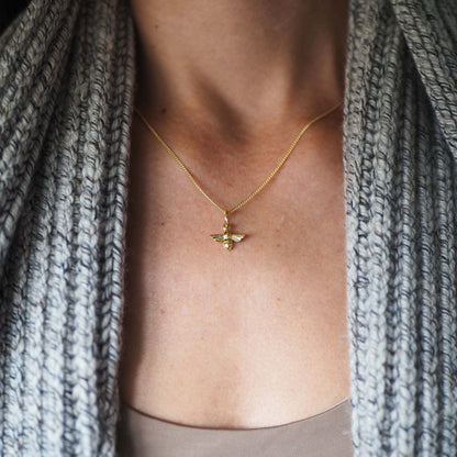 Bee necklace in 18ct solid gold, handmade in London, front view and on model 