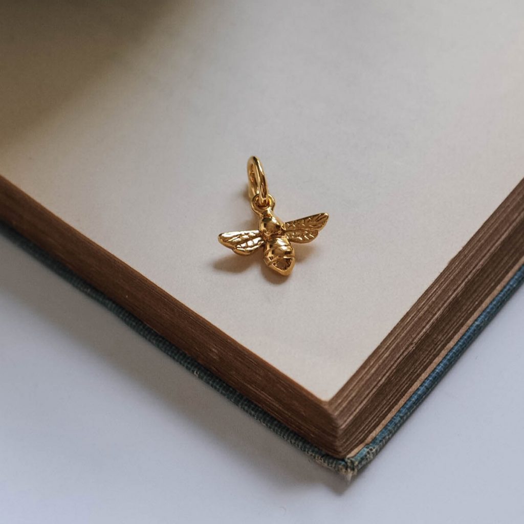 Bianca Jones Jewellery handmade solid gold bumble bee charm, available in white, rose, and yellow gold, showcasing detailed craftsmanship