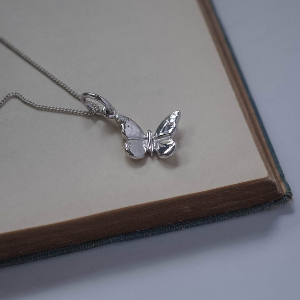 Bianca Jones butterfly pendant available in sterling silver or gold vermeil, capturing the essence of transformation and grace.