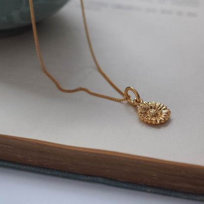 Bianca Jones daisy necklace available in silver or gold vermeil, symbolising innocence and new beginnings