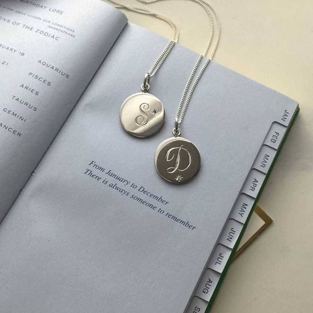 Silver Diamond Initial Necklace with hand-engraved letter and star-set diamond. Handmade in London in solid sterling silver.