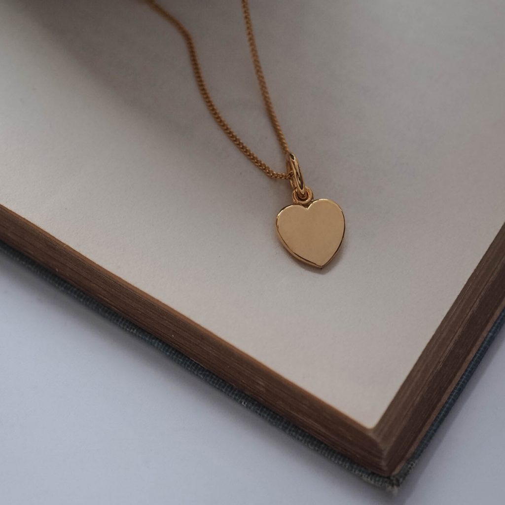 Solid Sterling Silver or Gold Love Heart Necklace, heart-shaped pendant symbolising love and affection. Crafted from recycled materials.