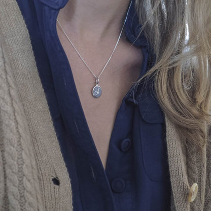 Initial Mini Necklace with a hand-engraved scrolled initial, perfect for layering or wearing alone. A personalised piece symbolising love and connection.