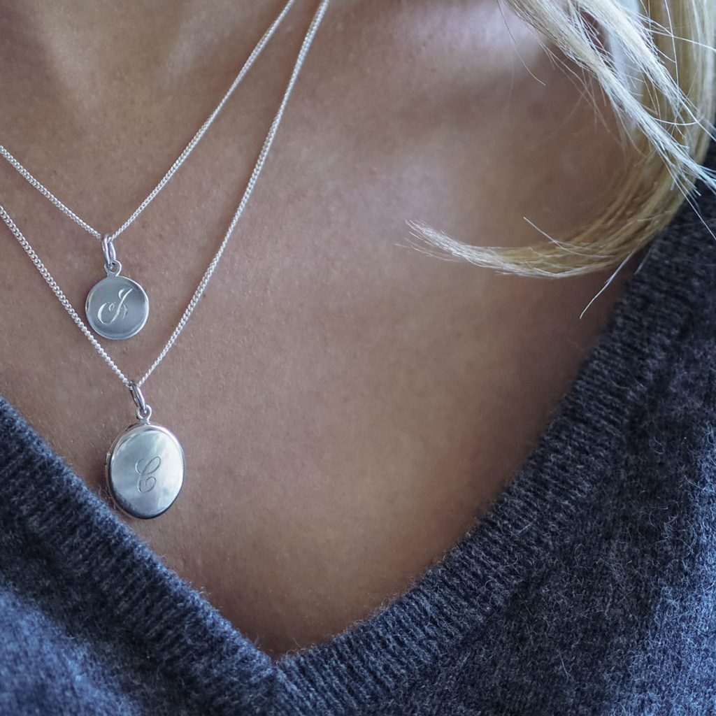 Initial Mini Necklace with a hand-engraved scrolled initial, perfect for layering or wearing alone. A personalised piece symbolising love and connection.